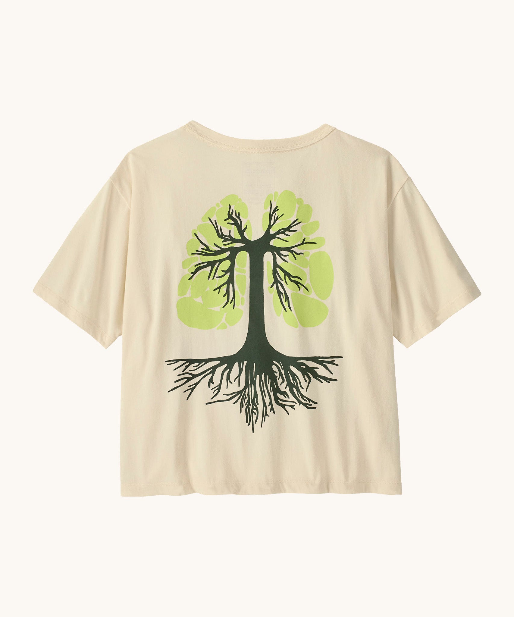Patagonia women's easy cut short sleeve t-shirt in cream with green tree roots graphic on the back