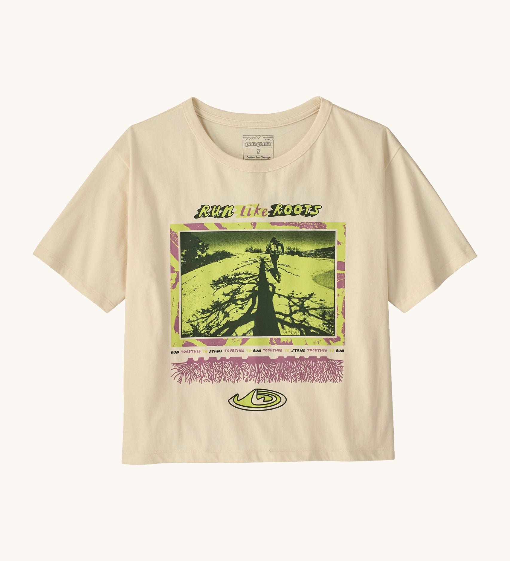 Patagonia women's easy cut short sleeve t-shirt in cream with retro run like roots graphic on the front