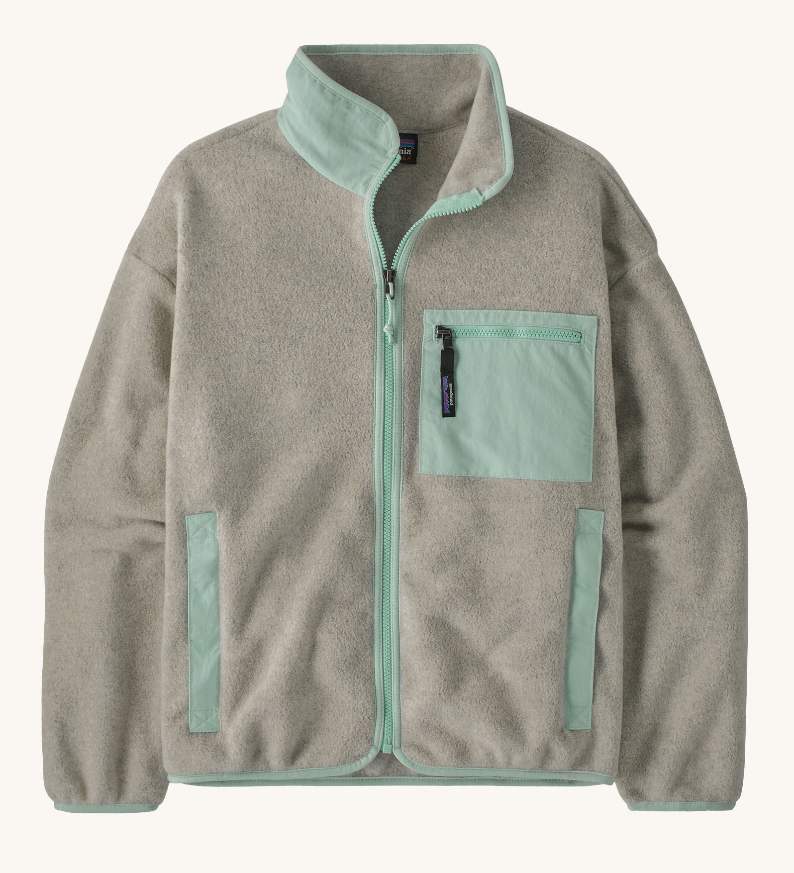 Patagonia women's synchilla fleece jacket in light grey and blue trim. With a full length front zip, side pockets and alight blue patch pocket