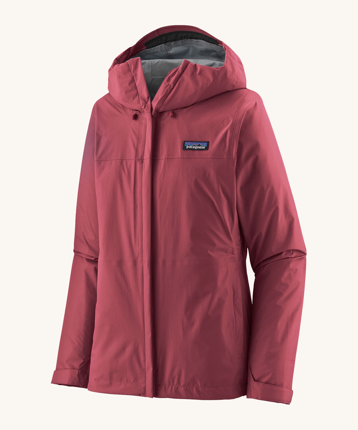 Patagonia women's torrentshell 3L jacket in a red colour on a cream background.