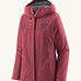 Patagonia women's torrentshell 3L jacket in a red colour on a cream background.