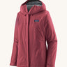 Patagonia women's torrentshell 3L jacket in a red colour on a cream background.