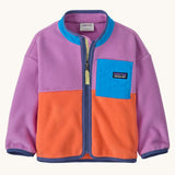 Patagonia little kids synchilla fleece in brisk purple available at Babipur. A 100% recycled polyester soft fleece jacket in bright purple and orange with purple trim. Features a full length zip and a blue chest pocket