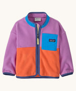 Patagonia little kids synchilla fleece in brisk purple available at Babipur. A 100% recycled polyester soft fleece jacket in bright purple and orange with purple trim. Features a full length zip and a blue chest pocket