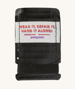 Patagonia field repair kit in black front detail