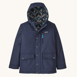 The Kids infurno fleece-lined coat from Patagonia, with a patterned inner lining and a navy outer.