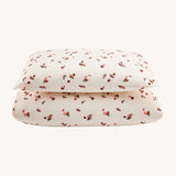 Avery Row Organic Cotton Bedding Set - Cotbed. A lovely Peach print on a cream fabric