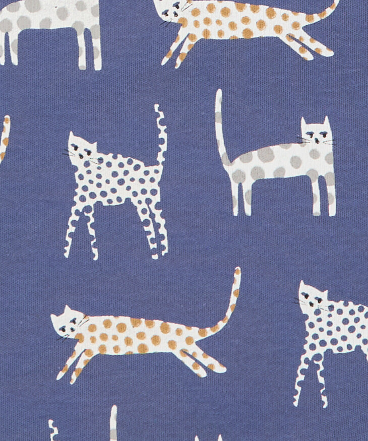 A close up of the cat print on the inner liner of the Pigeon Organics baby jacket in velvet blue available at Babipur