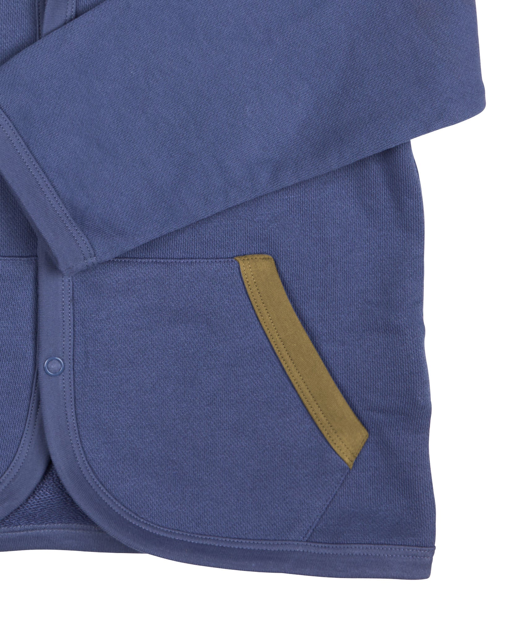 A close up of the Pigeon Organics baby jacket in velvet blue available at Babipur showing the dark green trim detail on the side pocket