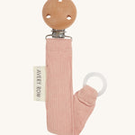 Avery Row Pacifier Holder - Pink, showing the silicone ring and wooden clip
