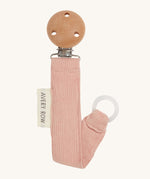 Avery Row Pacifier Holder - Pink, showing the silicone ring and wooden clip