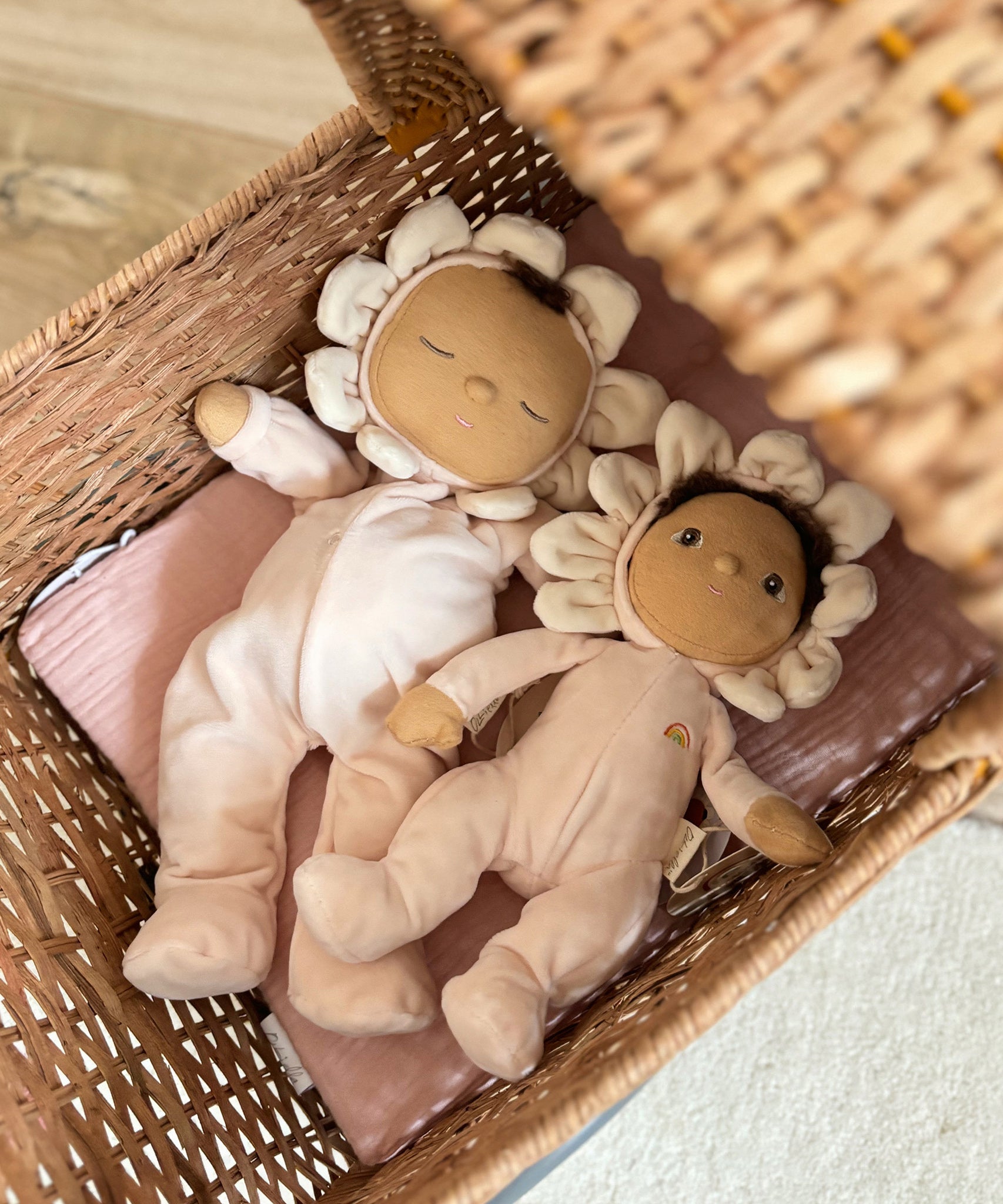 The Olli Ella Limited Edition Blossom Buds Gift Set - Gardenia, showing the Tootsie Gardenia & Dinky Dinkum Doll - Gracie Gardenia laid inside an Olli Ella Strolley 
