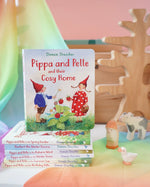 Pippa and Pelle cosy home children's board book by Daniela Drescher, stacked in the Babipur playroom with other books from that series.