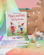 Pippa and Pelle Spring Garden children's board book by Daniela Drescher, stacked with books from that series, in the Babipur playroom. 