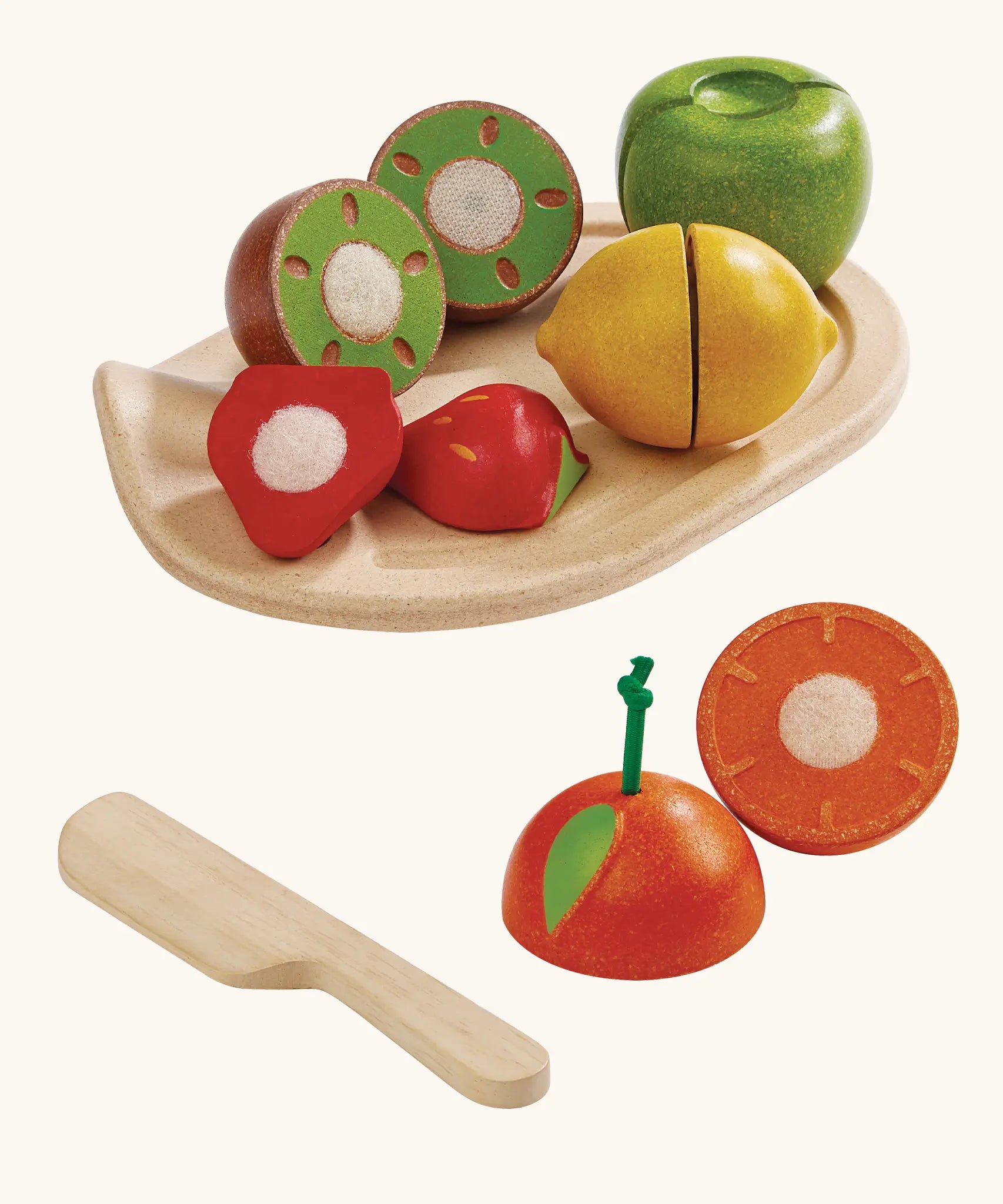 PlanToys wooden assorted fruit set. Includes different fruit to cut pieces, serving tray and knife