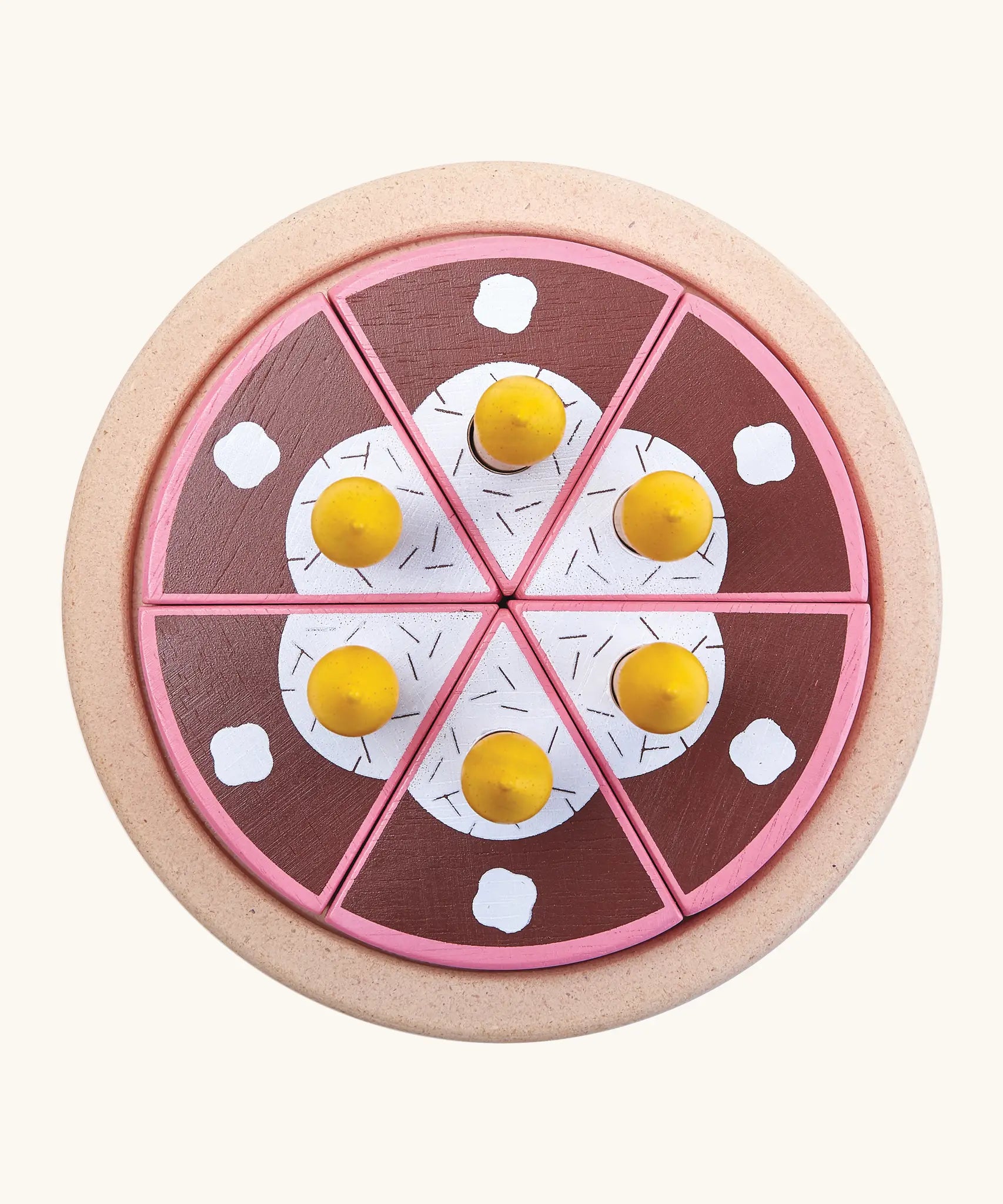Overheard view of a PlanToys birthday cake wooden set showing brown slices with candles on a serving plate