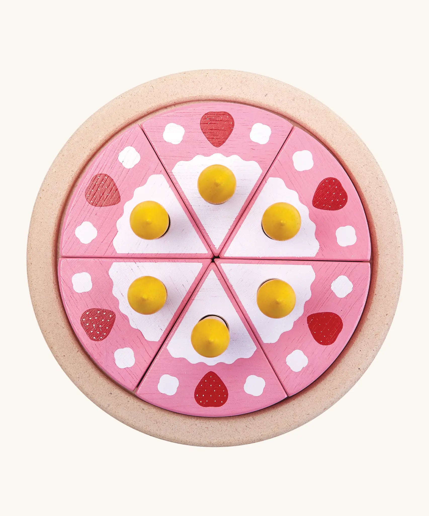 Overheard view of a PlanToys birthday cake wooden set showing pink slices with candles on a serving plate