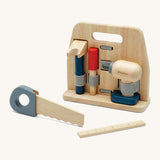Plan Toys wooden handy carpenter set available at Babipur. Set including a saw, drill, chisel, claw hammer, ruler and a wooden tool stand. Each tool is held by an elasticated fabric band.