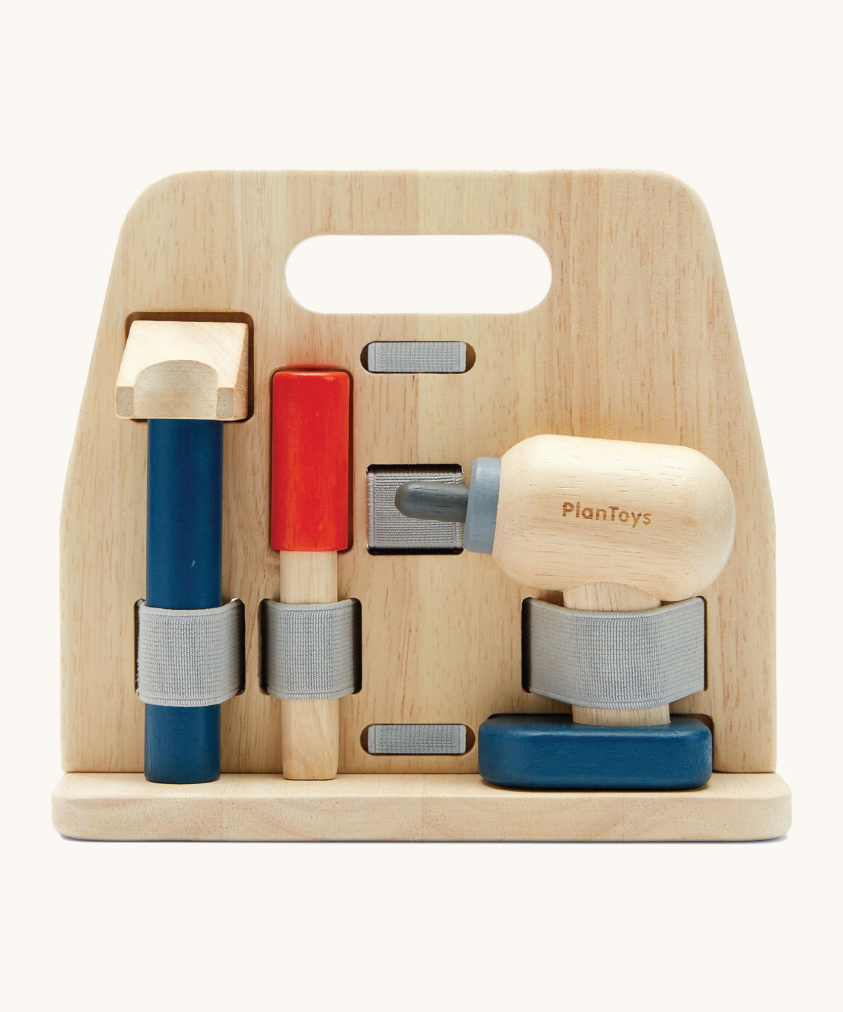 A front image of the Plan Toys wooden handy carpenter set available at Babipur showing a closer look at the hammer, chisel and drill on the tool stand.