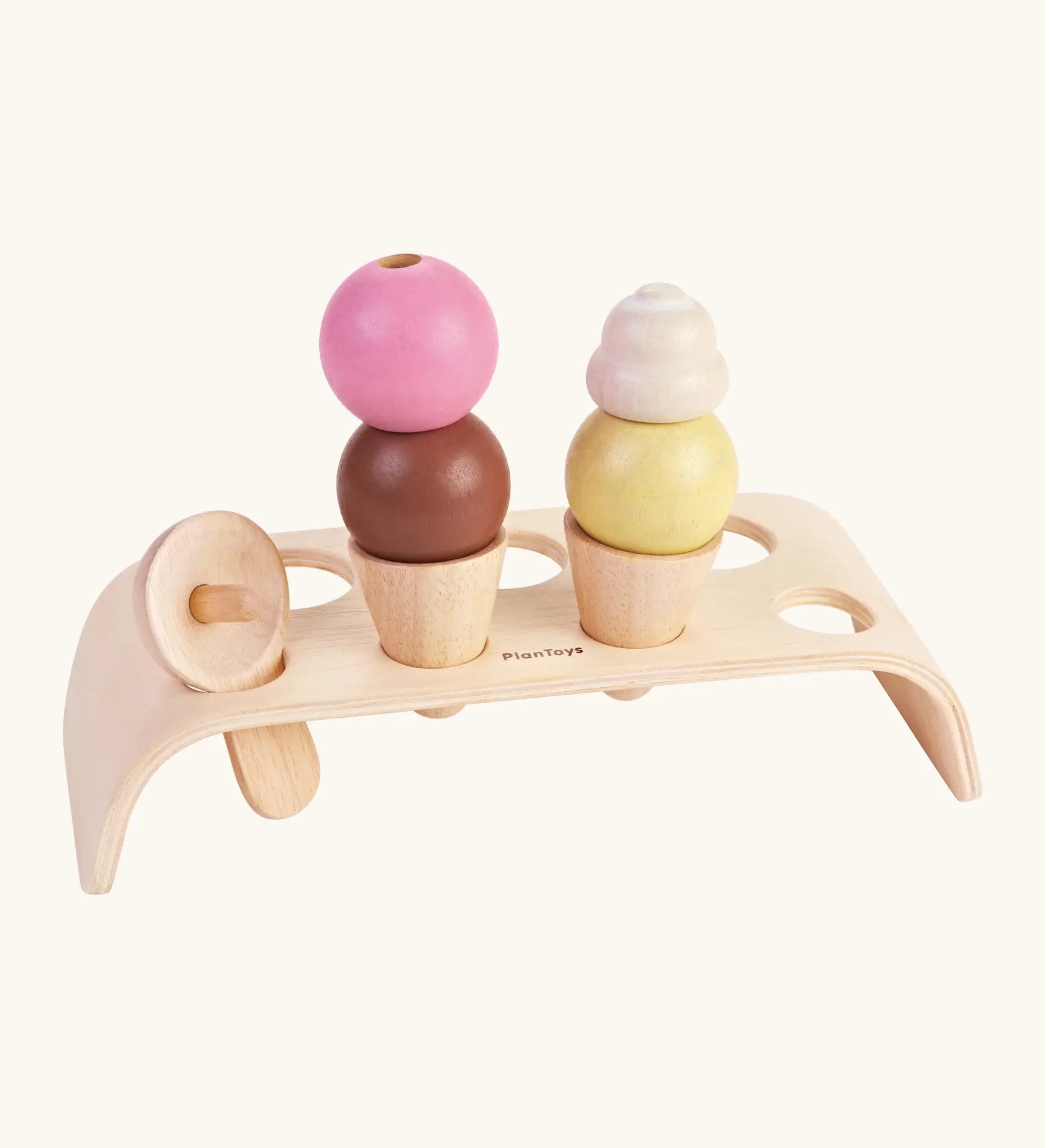 PlanToys wooden ice cream play set. Includes coloured ice creams, cream topping, scoop and serving tray