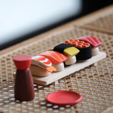 PlanToys wooden sushi play set standing on a table