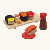 PlanToys wooden sushi play set. Includes a serving board, sauce and  play food pieces