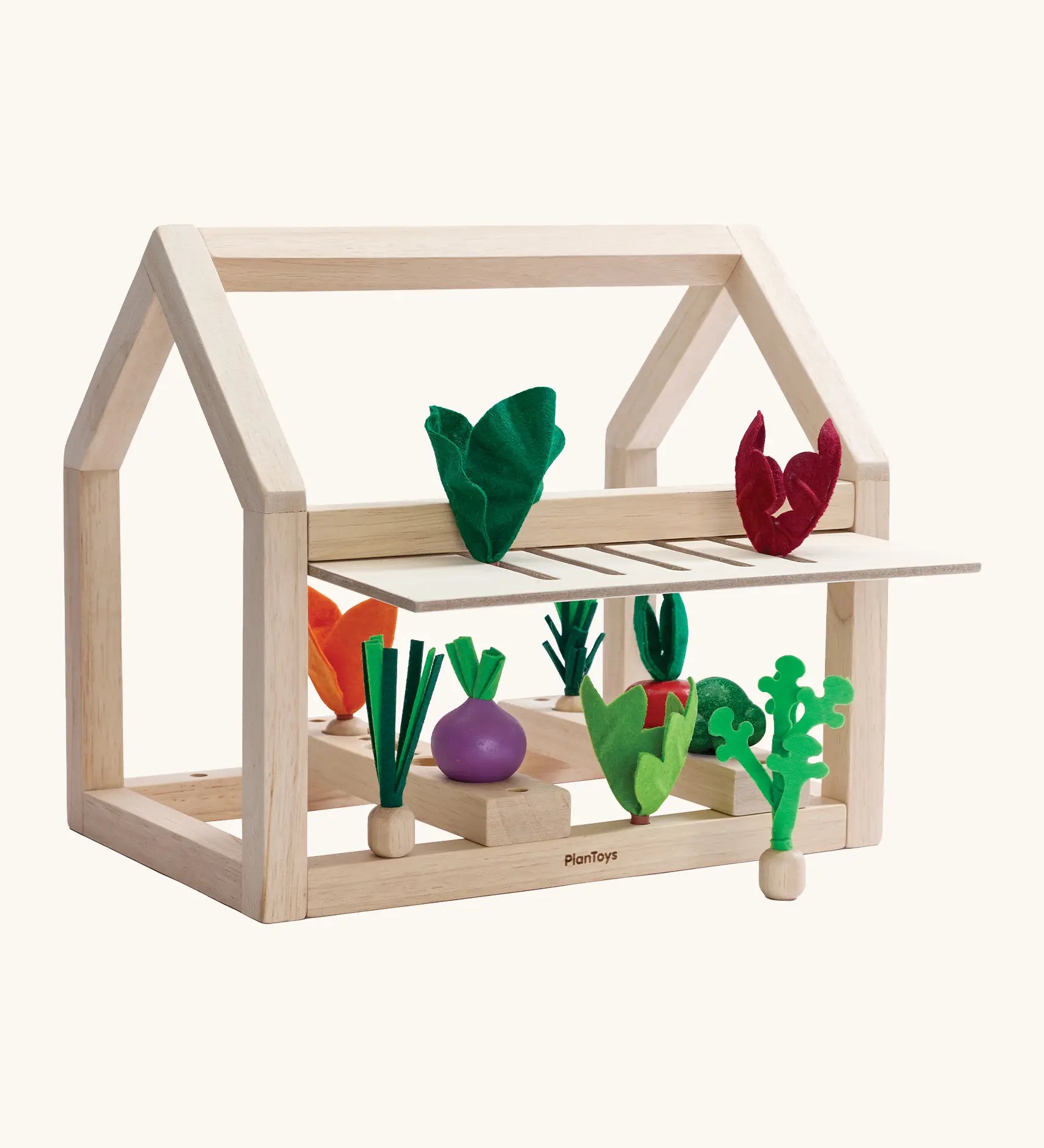 PlanToys wooden blooming greenhouse from the build a garden range. Set includes a frame, different veg and sorting pieces