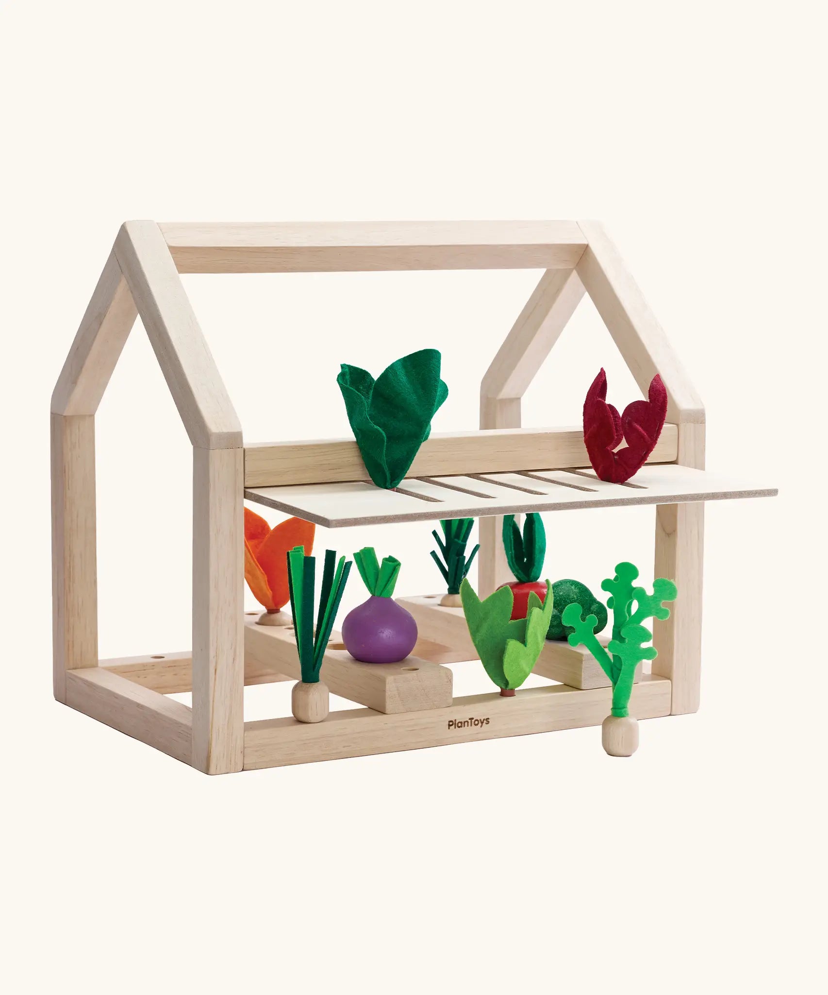PlanToys wooden blooming greenhouse from the build a garden range. Set includes a frame, different veg and sorting pieces