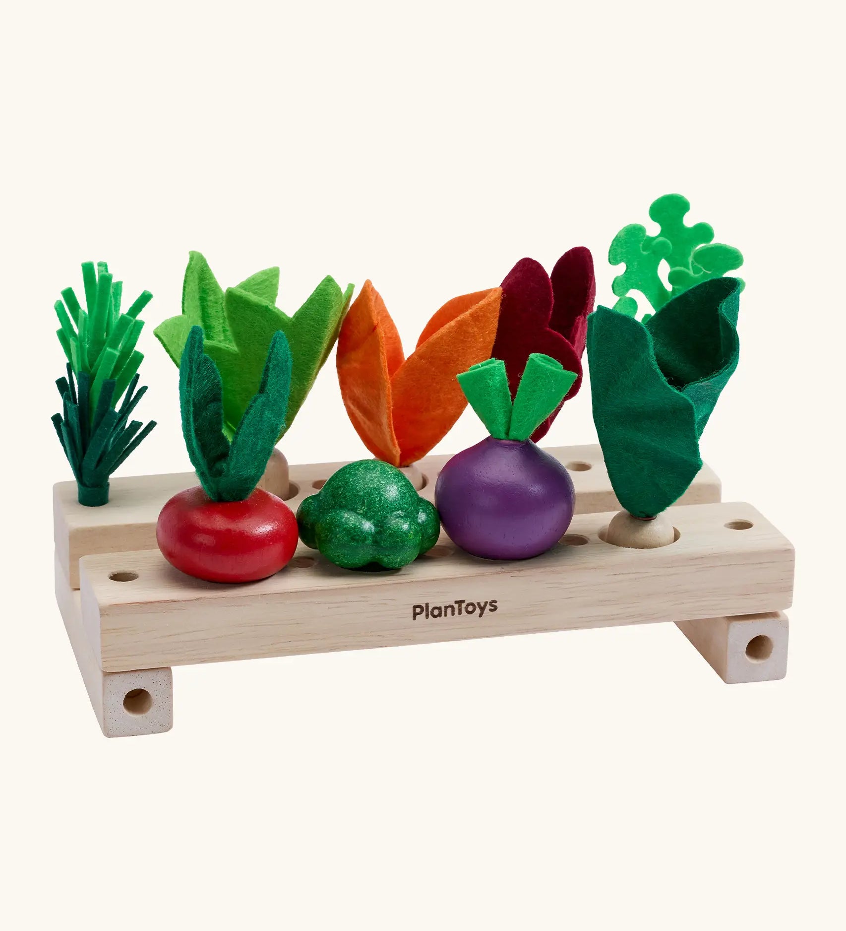 PlanToys stack & sprout set from the build a garden range. Comes with different veg pieces and 2 wooden sorting planters