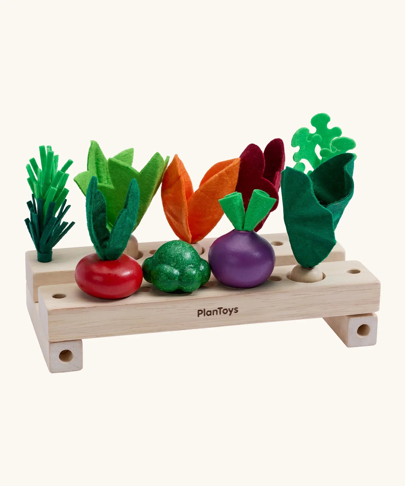 PlanToys stack & sprout set from the build a garden range. Comes with different veg pieces and 2 wooden sorting planters