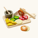 PlanToys wooden cheese and charcuterie board toy set features different food and cutlery pieces