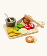 PlanToys wooden cheese and charcuterie board toy set features different food and cutlery pieces