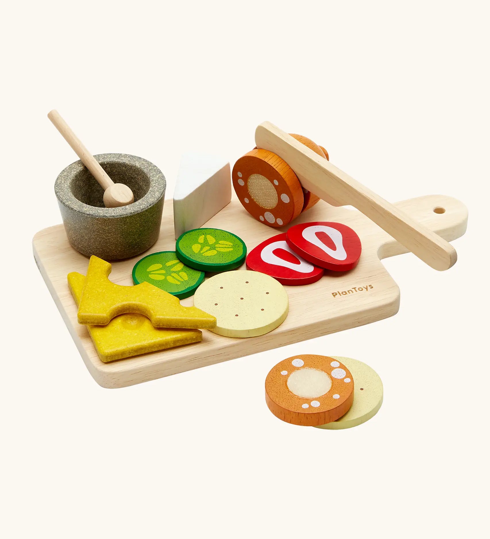 PlanToys wooden cheese and charcuterie board toy set features different food and cutlery pieces