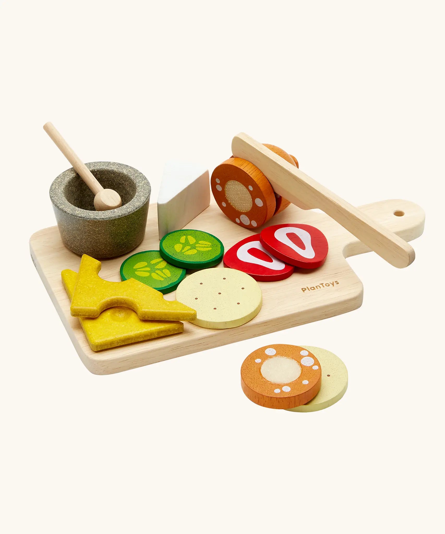 PlanToys wooden cheese and charcuterie board toy set features different food and cutlery pieces