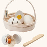 PlanToys crack & cook egg basket set. Features 3 eggs to cut and a wooden knife