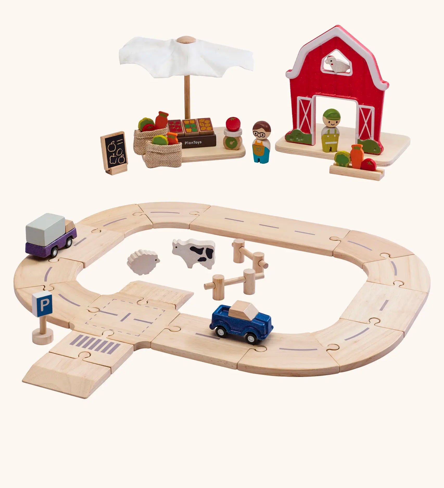 PlanToys wooden farm to market roadway playset. Features a market, farm set, road pieces and vehicles