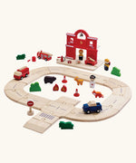 PlanToys fire & rescue roadway set. Features road pieces, emergency vehicles and figures, woodland animal figures and a fire station