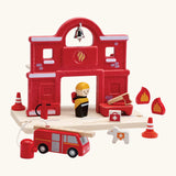 PlanToys fire station extension set compatible with other road sets. Features a fire station, fire engine and fireman figure