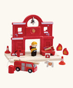 PlanToys fire station extension set compatible with other road sets. Features a fire station, fire engine and fireman figure