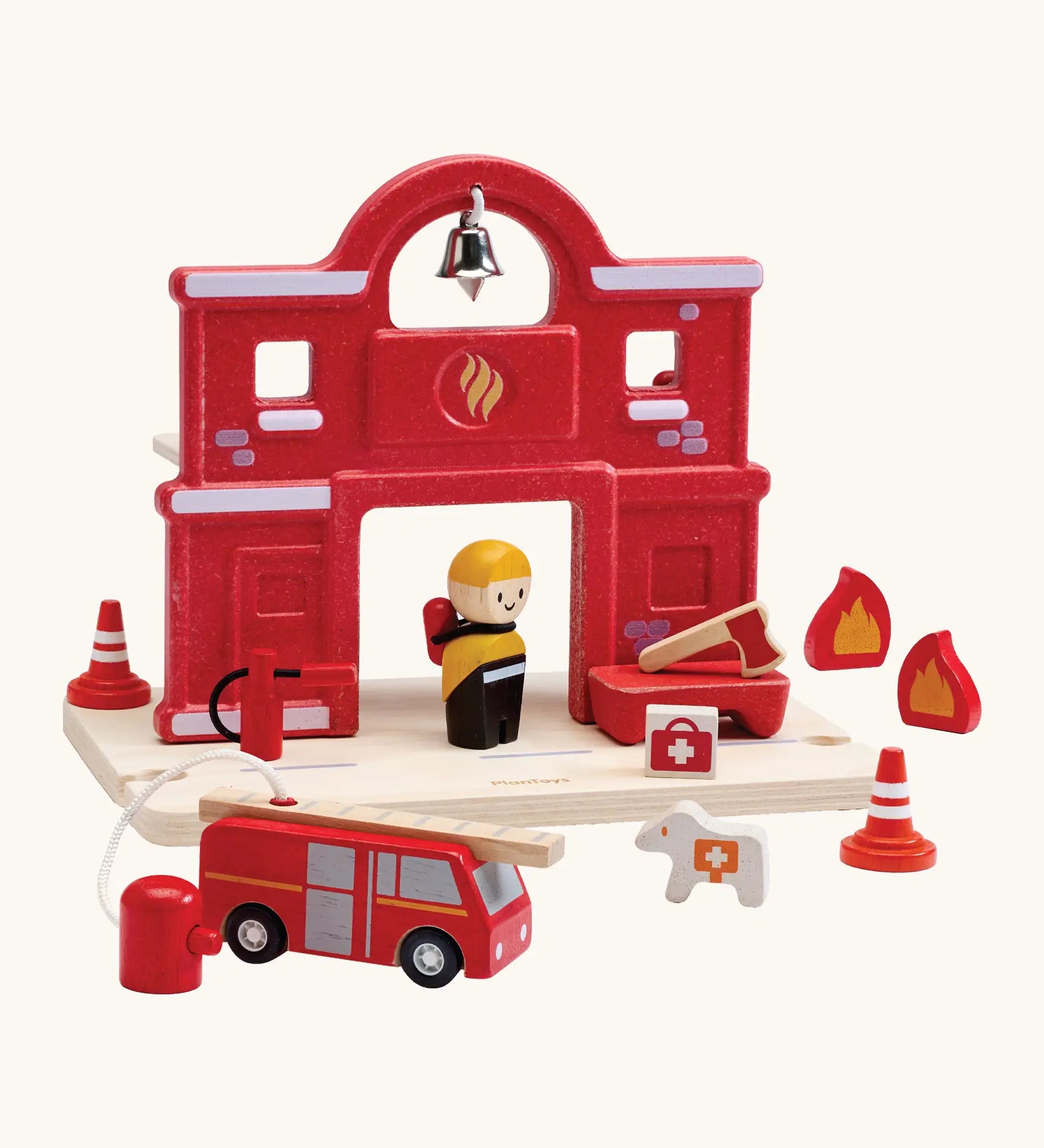 PlanToys fire station extension set compatible with other road sets. Features a fire station, fire engine and fireman figure