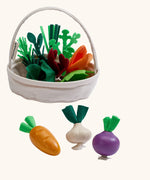 PlanToys fresh veggie basket set includes various loose wooden veg pieces