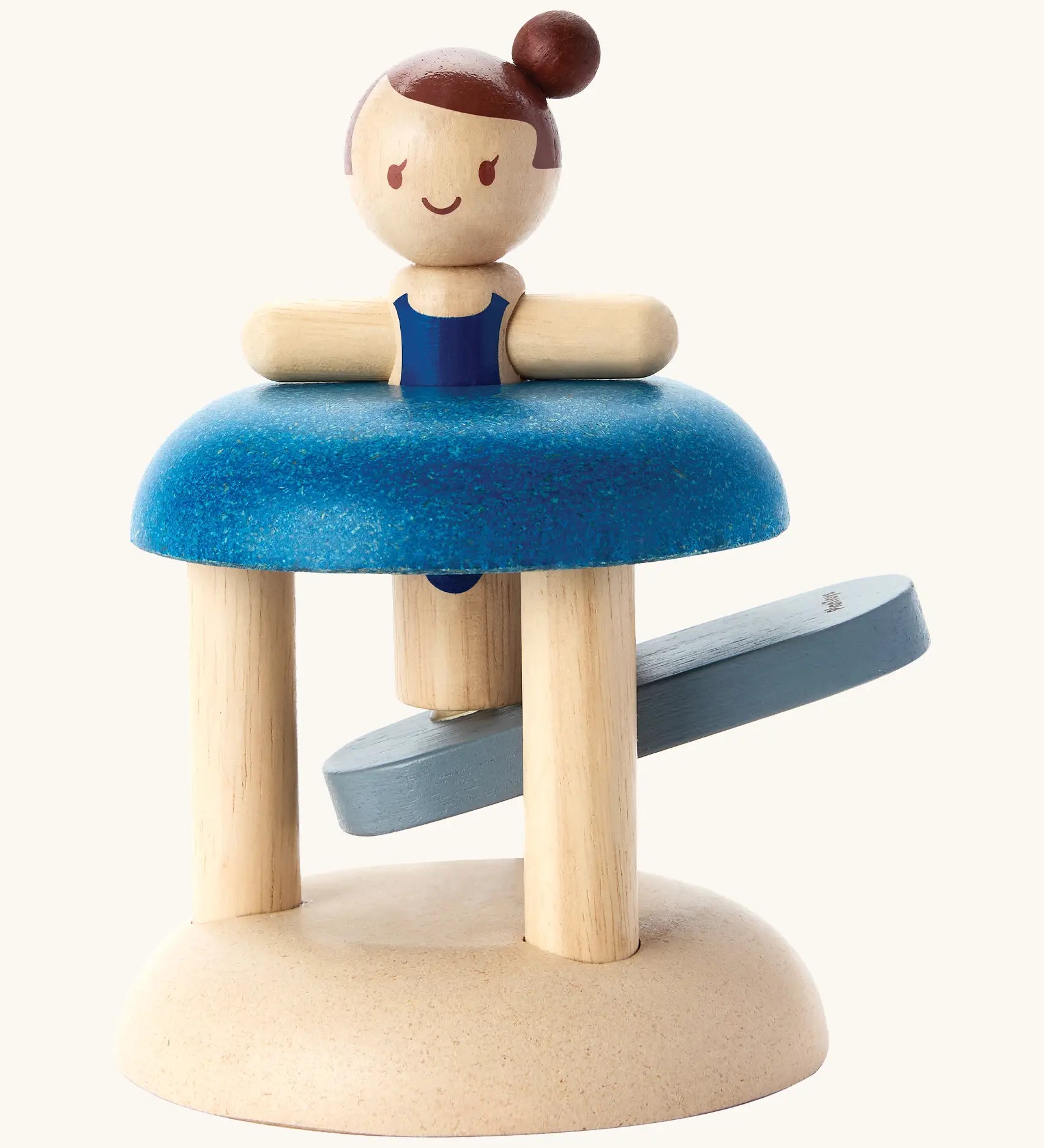 PlanToys wooden jumping gymnast. A interactive toy showing a gymnast peg doll slotted with a working base to launch the peg doll 