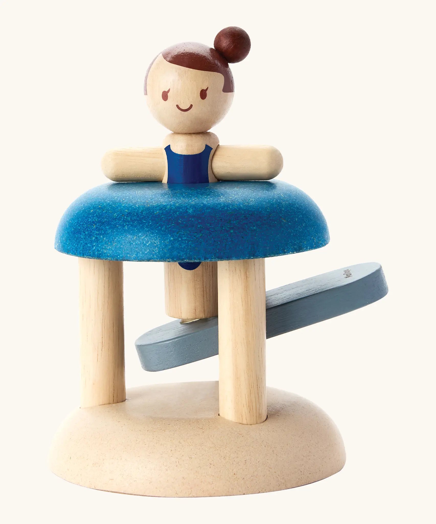 PlanToys wooden jumping gymnast. A interactive toy showing a gymnast peg doll slotted with a working base to launch the peg doll 