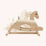 The PlanToys Lusitano Rocking Horse image showing the way the horse rocks back and forth, on a cream background
