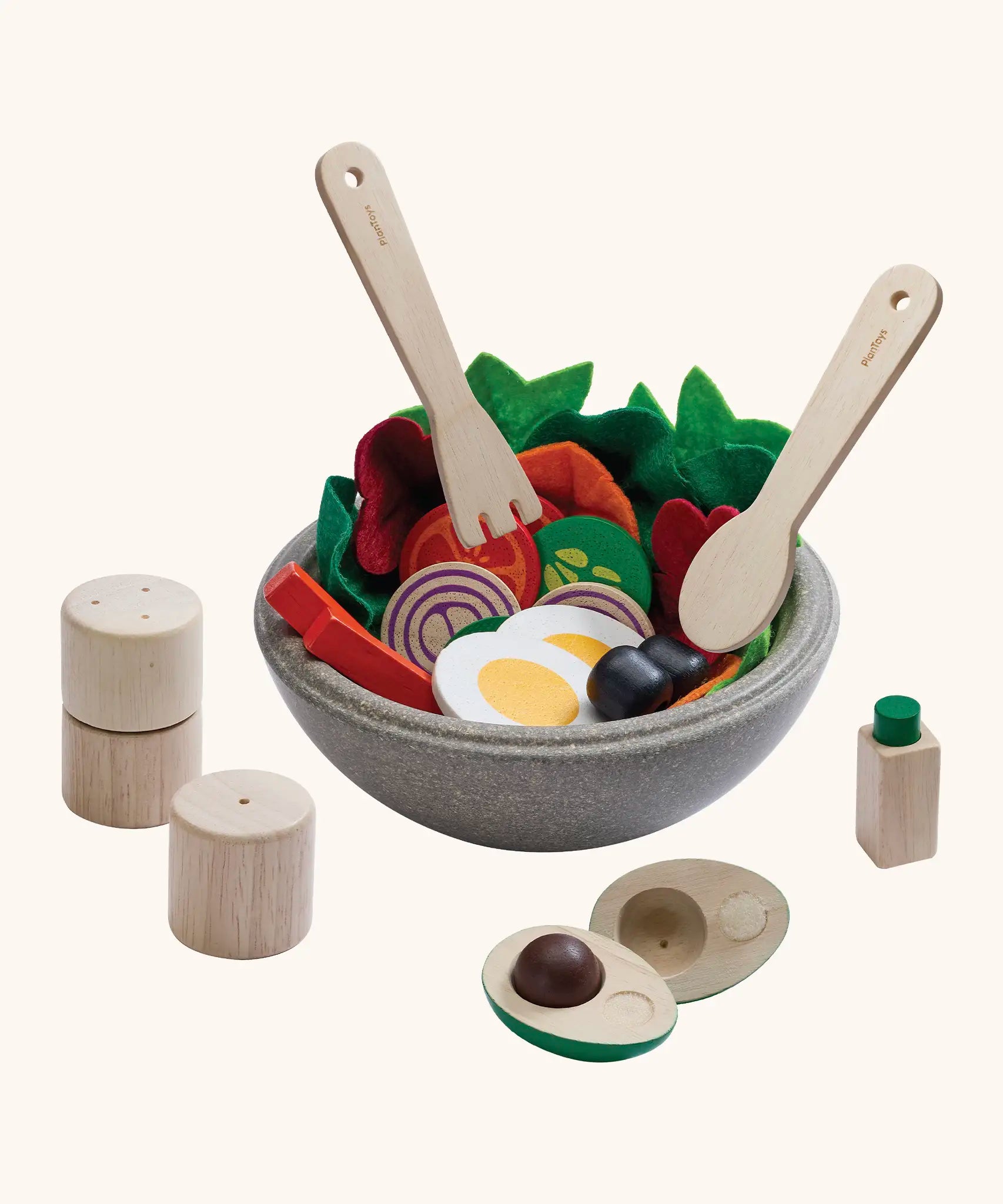 PlanToys wooden little chef's salad set. showing playfood inside a bowl and cutlery hovering above 