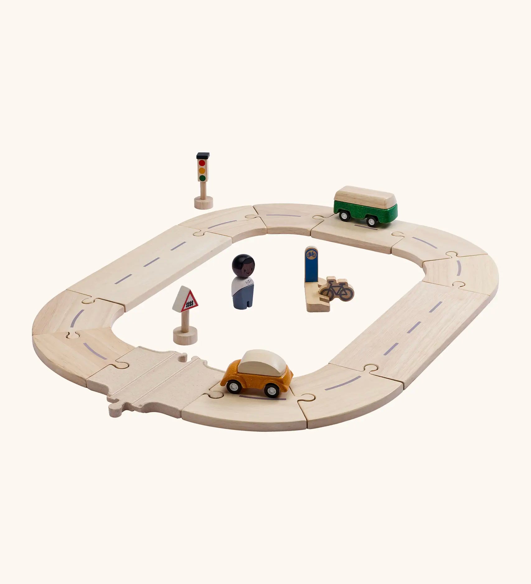 PlanToys my first roadway set. Includes wooden road and rail pieces, vehicles, signs and a wooden person figure