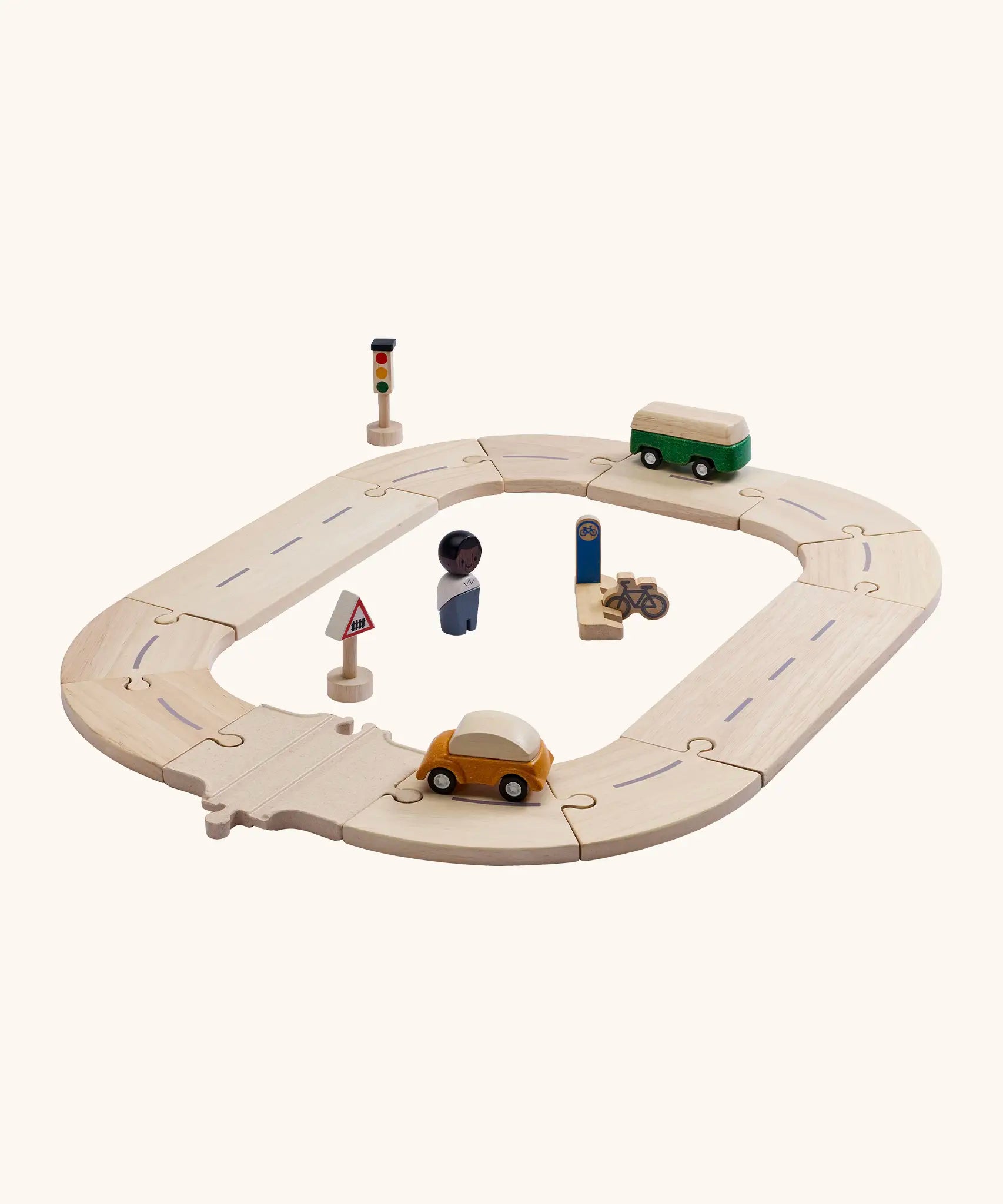 PlanToys my first roadway set. Includes wooden road and rail pieces, vehicles, signs and a wooden person figure
