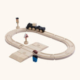 A PlanToys my first train set showing a train and carriage with a magnetic connector