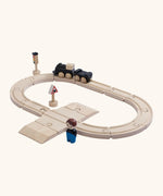 A PlanToys my first train set showing a train and carriage with a magnetic connector