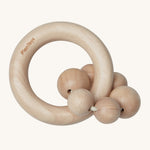 PlanToys Natural Wooden Beads Rattle is a beautifully crafted, wooden baby rattle that is perfect for teething and sore gums. The rattle comes with a wooden ring, and attached to the ring natural wood beads. The image is on a cream background